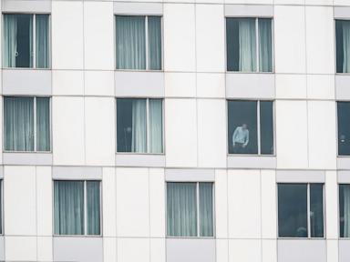Gunman kills a Montreal officer at a Hilton hotel before being shot dead, police say